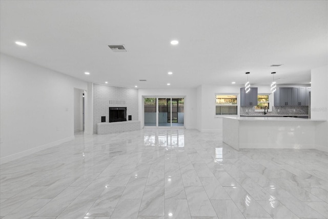 4175 N Concord Dr, Crystal River, FL 34428 - unfurnished living room with visible vents, baseboards, recessed lighting, and marble finish floor