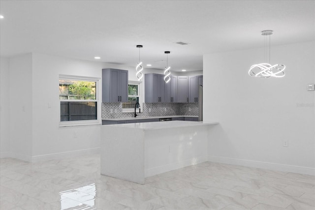 4175 N Concord Dr, Crystal River, FL 34428 - kitchen with backsplash, light countertops, recessed lighting, and marble finish floor