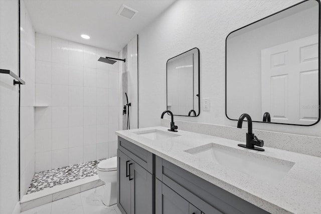 4175 N Concord Dr, Crystal River, FL 34428 - full bath with a sink, visible vents, toilet, and marble finish floor