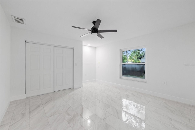 4175 N Concord Dr, Crystal River, FL 34428 - unfurnished bedroom featuring a closet, visible vents, baseboards, and a ceiling fan