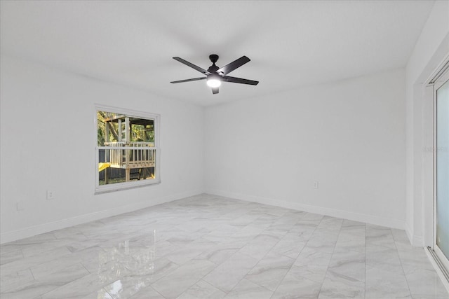 4175 N Concord Dr, Crystal River, FL 34428 - spare room with ceiling fan, marble finish floor, and baseboards