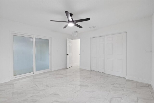 4175 N Concord Dr, Crystal River, FL 34428 - unfurnished bedroom featuring visible vents, baseboards, a ceiling fan, and marble finish floor