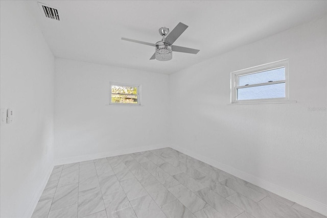 4175 N Concord Dr, Crystal River, FL 34428 - empty room featuring baseboards, a ceiling fan, and visible vents