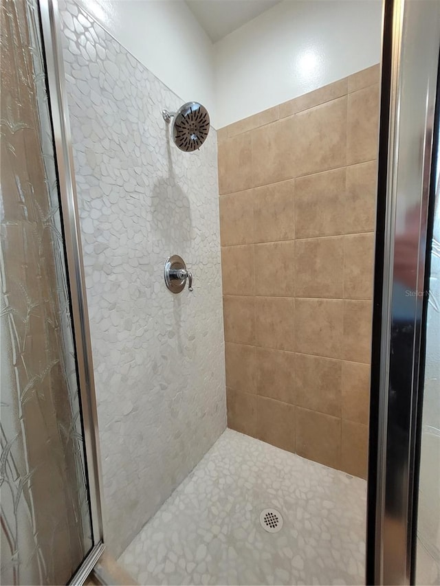 bathroom featuring a stall shower