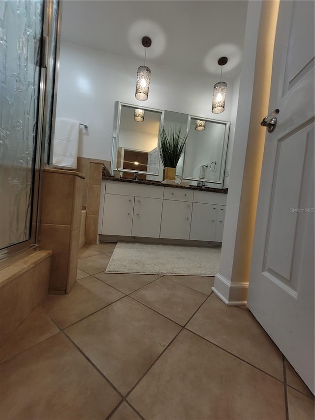 824 Greenbelt Cir, Brandon, FL 33510 - full bath featuring double vanity, tile patterned flooring, and a shower