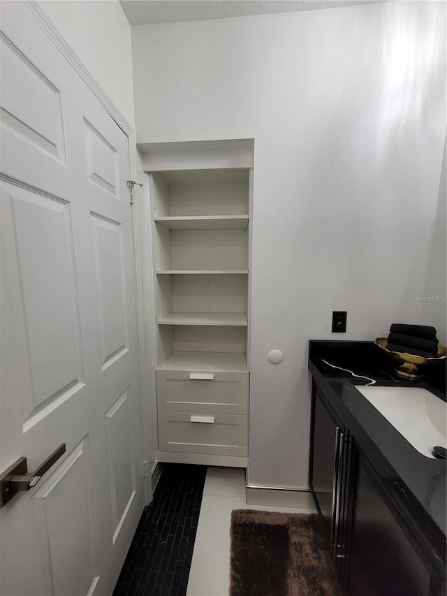 824 Greenbelt Cir, Brandon, FL 33510 - bathroom featuring vanity and tile patterned flooring
