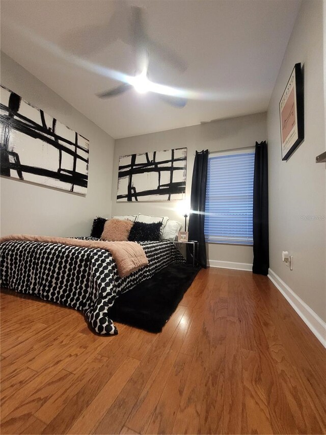 824 Greenbelt Cir, Brandon, FL 33510 - bedroom with wood finished floors and a ceiling fan