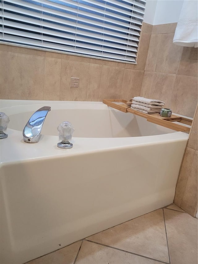 824 Greenbelt Cir, Brandon, FL 33510 - full bath featuring tile patterned flooring, a bath, and tile walls