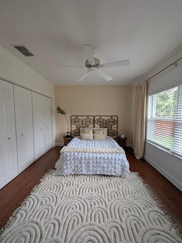 824 Greenbelt Cir, Brandon, FL 33510 - bedroom with wood finished floors, ceiling fan, and a closet