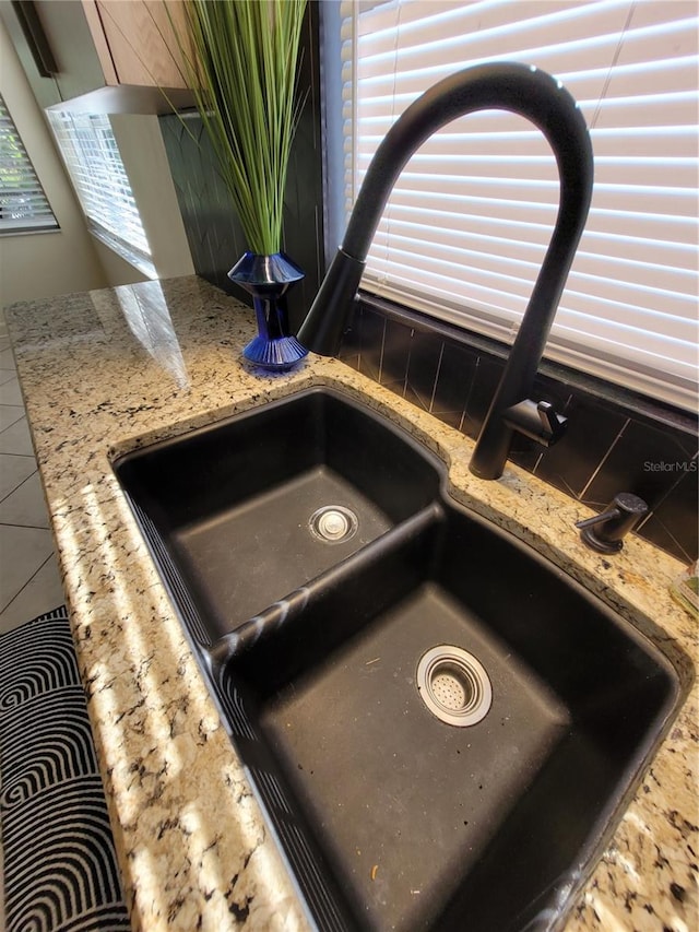 824 Greenbelt Cir, Brandon, FL 33510 - kitchen view of a sink and light stone countertops