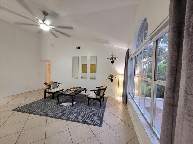 824 Greenbelt Cir, Brandon, FL 33510 - dining area featuring light tile patterned floors, ceiling fan, and high vaulted ceiling