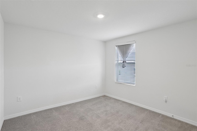 7530 Broad Pointe Dr, Zephyrhills, FL 33540 - unfurnished room featuring carpet and baseboards