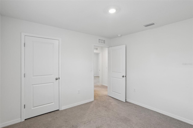 7530 Broad Pointe Dr, Zephyrhills, FL 33540 - unfurnished bedroom with carpet floors and baseboards