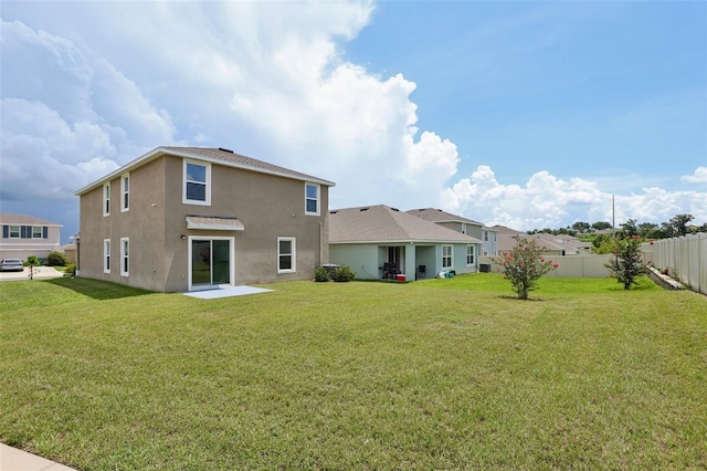 7530 Broad Pointe Dr, Zephyrhills, FL 33540 - back of property featuring stucco siding