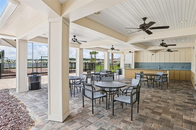 7530 Broad Pointe Dr, Zephyrhills, FL 33540 - view of patio / terrace with a ceiling fan and outdoor dining space
