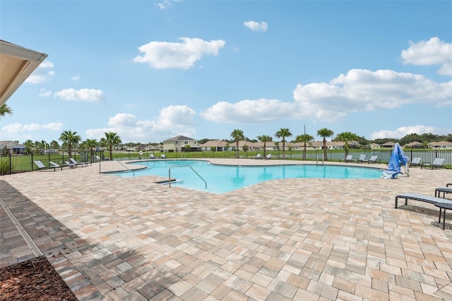 7530 Broad Pointe Dr, Zephyrhills, FL 33540 - community pool with a patio