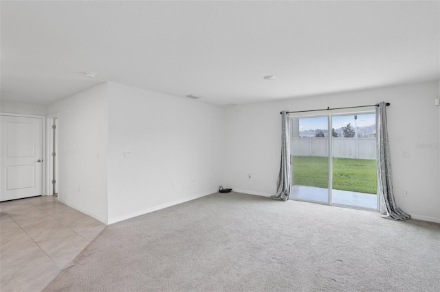 7530 Broad Pointe Dr, Zephyrhills, FL 33540 - empty room with light colored carpet and a smoke detector