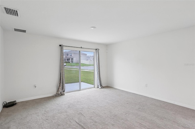 7530 Broad Pointe Dr, Zephyrhills, FL 33540 - carpeted empty room with baseboards