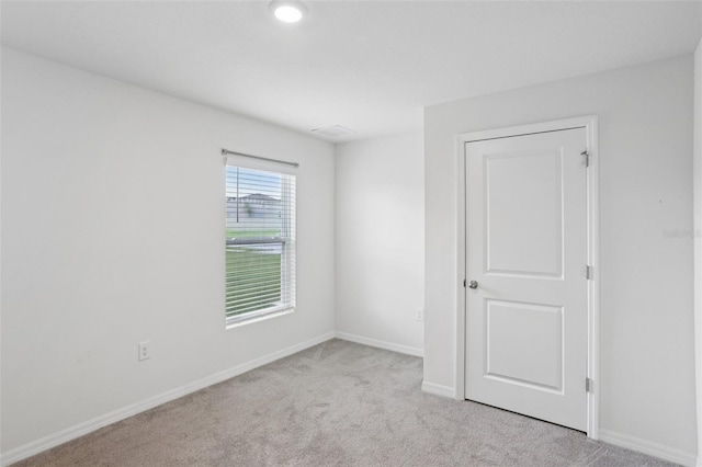 7530 Broad Pointe Dr, Zephyrhills, FL 33540 - carpeted empty room featuring baseboards