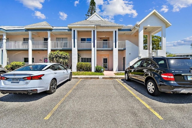2291 Americus Blvd W Unit 41, Clearwater, FL 33763 - view of building exterior featuring uncovered parking