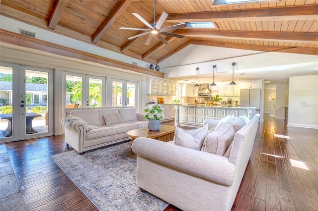898 Cypress Lakeview Ct, Tarpon Springs, FL 34688 - living room with french doors, wood ceiling, a ceiling fan, plenty of natural light, and beam ceiling