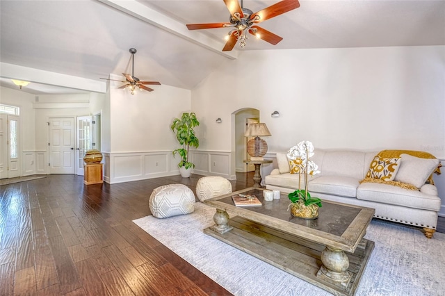 898 Cypress Lakeview Ct, Tarpon Springs, FL 34688 - living area with ceiling fan, arched walkways, hardwood / wood-style flooring, a wainscoted wall, and a decorative wall