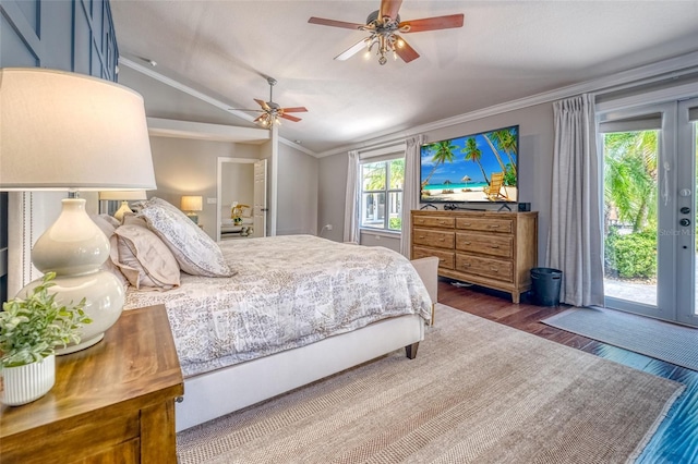 898 Cypress Lakeview Ct, Tarpon Springs, FL 34688 - bedroom featuring vaulted ceiling, access to exterior, wood finished floors, crown molding, and a ceiling fan