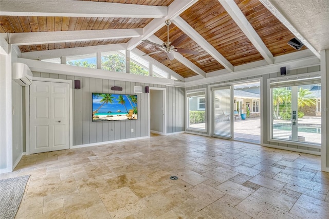 898 Cypress Lakeview Ct, Tarpon Springs, FL 34688 - unfurnished living room featuring stone tile floors, a wall unit AC, wood ceiling, ceiling fan, and baseboards