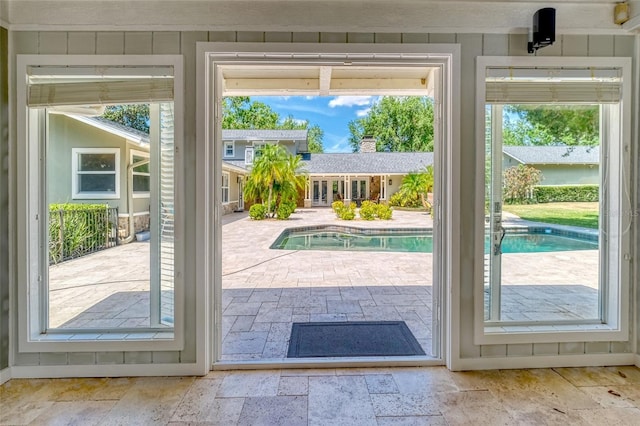 898 Cypress Lakeview Ct, Tarpon Springs, FL 34688 - entryway with stone tile floors and healthy amount of natural light