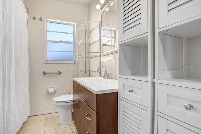 3214 W Rogers Ave, Tampa, FL 33611 - bathroom with vanity, toilet, tile patterned floors, and a shower with shower curtain