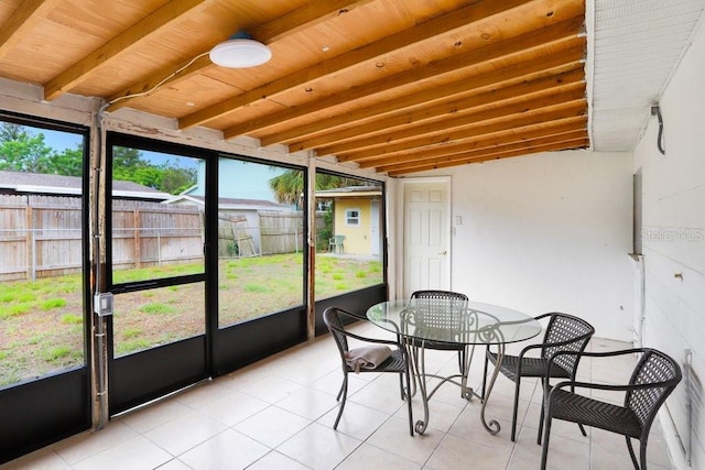 3214 W Rogers Ave, Tampa, FL 33611 - sunroom / solarium featuring outdoor dining space