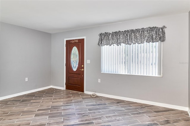3045 Stratford Dr, Largo, FL 33771 - foyer featuring wood finished floors and baseboards