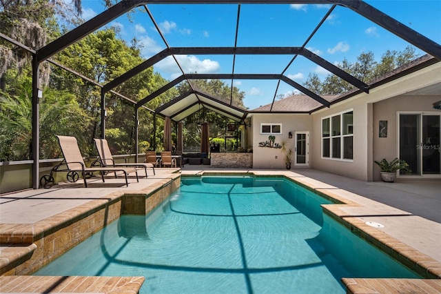 15930 Sorawater Dr, Lithia, FL 33547 - outdoor pool with a patio area and glass enclosure