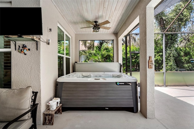 15930 Sorawater Dr, Lithia, FL 33547 - sunroom with a jacuzzi and ceiling fan