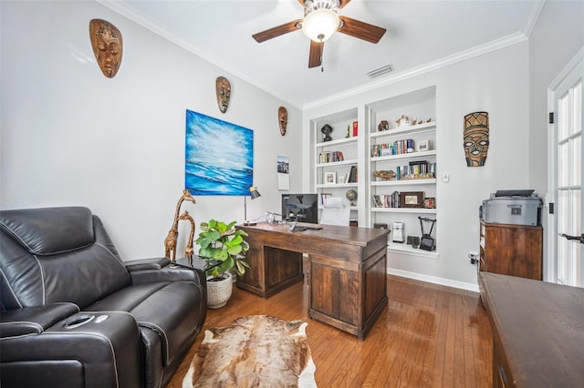 15930 Sorawater Dr, Lithia, FL 33547 - office with a ceiling fan, hardwood / wood-style flooring, built in features, crown molding, and baseboards