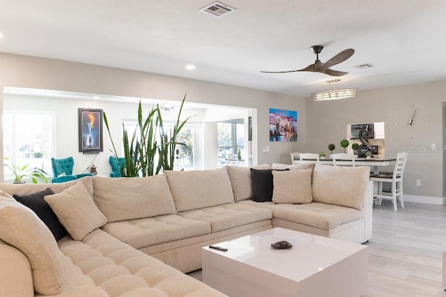 600 Eleuthera Dr, Punta Gorda, FL 33950 - living area with light wood-type flooring, a ceiling fan, visible vents, recessed lighting, and baseboards