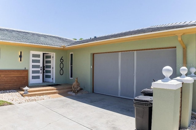 600 Eleuthera Dr, Punta Gorda, FL 33950 - doorway to property with stucco siding