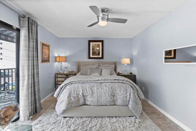 105 4th Ave NE Unit 219, Saint Petersburg, FL 33701 - bedroom with baseboards and ceiling fan