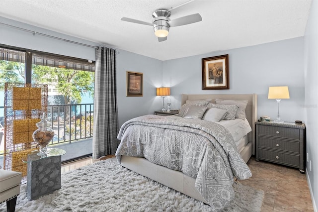 105 4th Ave NE Unit 219, Saint Petersburg, FL 33701 - bedroom with access to outside and ceiling fan