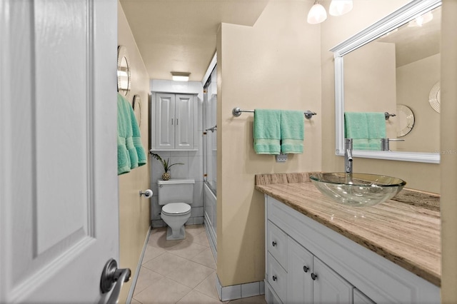 105 4th Ave NE Unit 219, Saint Petersburg, FL 33701 - full bath featuring toilet, shower / bath combination, tile patterned flooring, and vanity