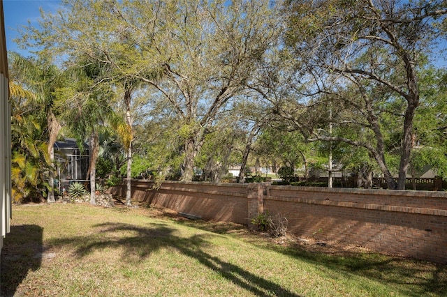 view of yard featuring fence