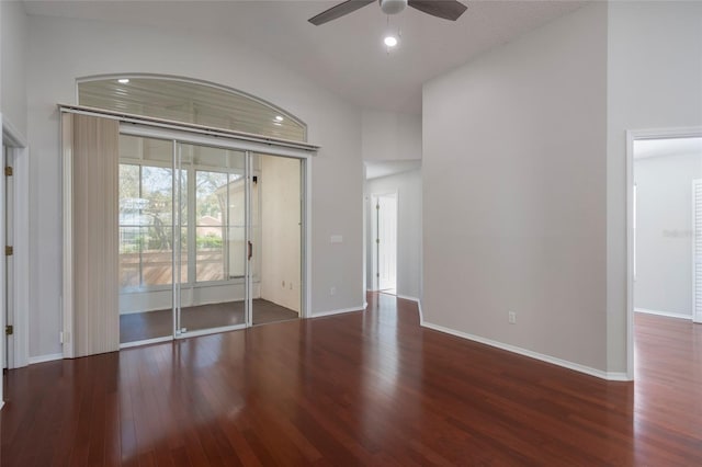 unfurnished room featuring baseboards, ceiling fan, recessed lighting, wood finished floors, and lofted ceiling