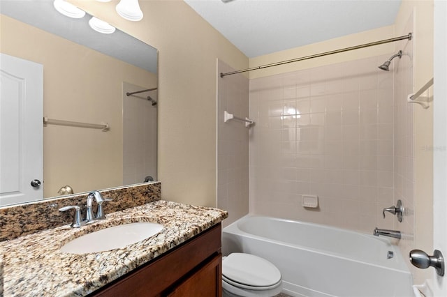 bathroom featuring shower / bathtub combination, vanity, and toilet