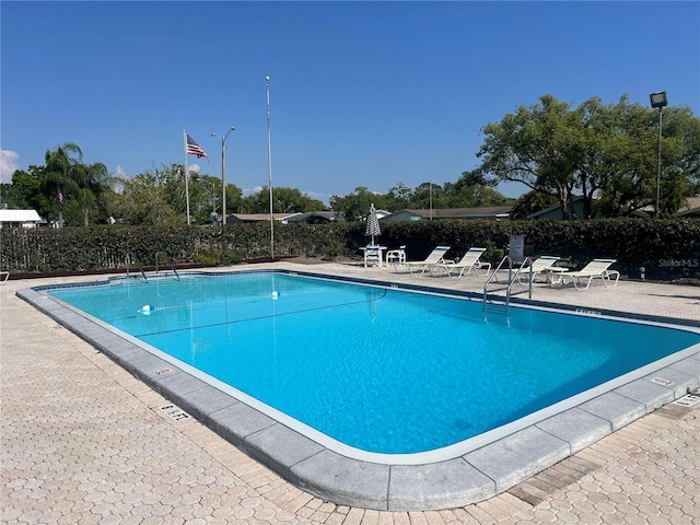 4237 Tamargo Dr Unit 4237, New Port Richey, FL 34652 - community pool featuring a patio