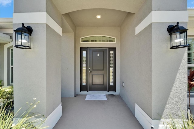 5419 Knights Landing Dr, Lakeland, FL 33810 - view of exterior entry with stucco siding