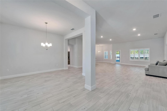 5419 Knights Landing Dr, Lakeland, FL 33810 - unfurnished living room with a chandelier, recessed lighting, visible vents, and light wood-style flooring