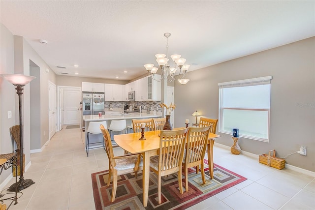 6333 Milestone Loop, Palmetto, FL 34221 - dining space with recessed lighting, baseboards, a notable chandelier, and light tile patterned floors