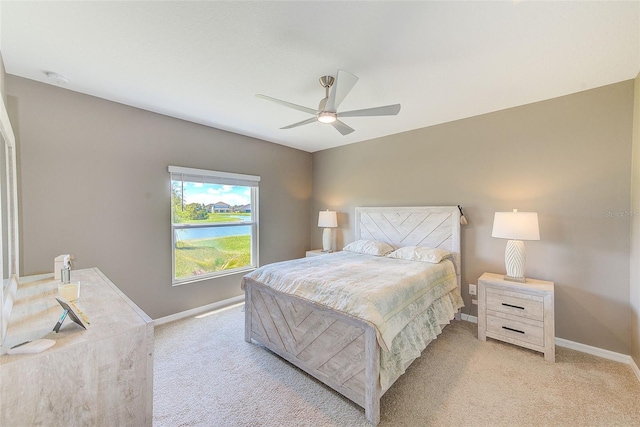 6333 Milestone Loop, Palmetto, FL 34221 - bedroom featuring a ceiling fan, baseboards, and carpet