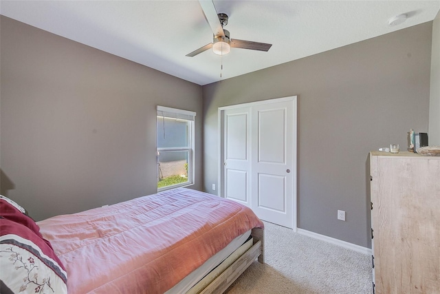 6333 Milestone Loop, Palmetto, FL 34221 - bedroom featuring ceiling fan, carpet floors, a closet, and baseboards