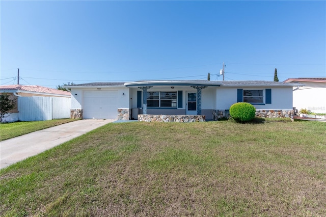 single story home featuring driveway, stucco siding, stone siding, and an attached garage